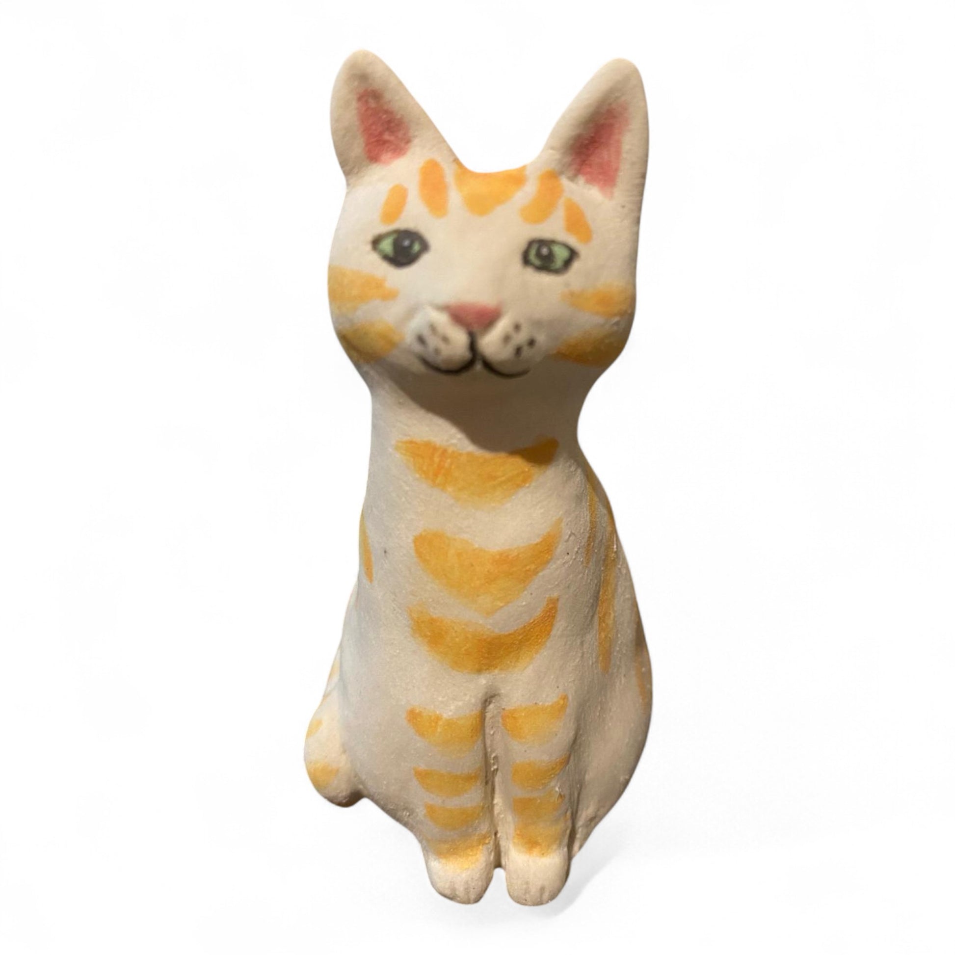 Porcelain yellow striped cat figurine