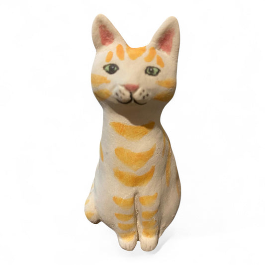 Porcelain yellow striped cat figurine