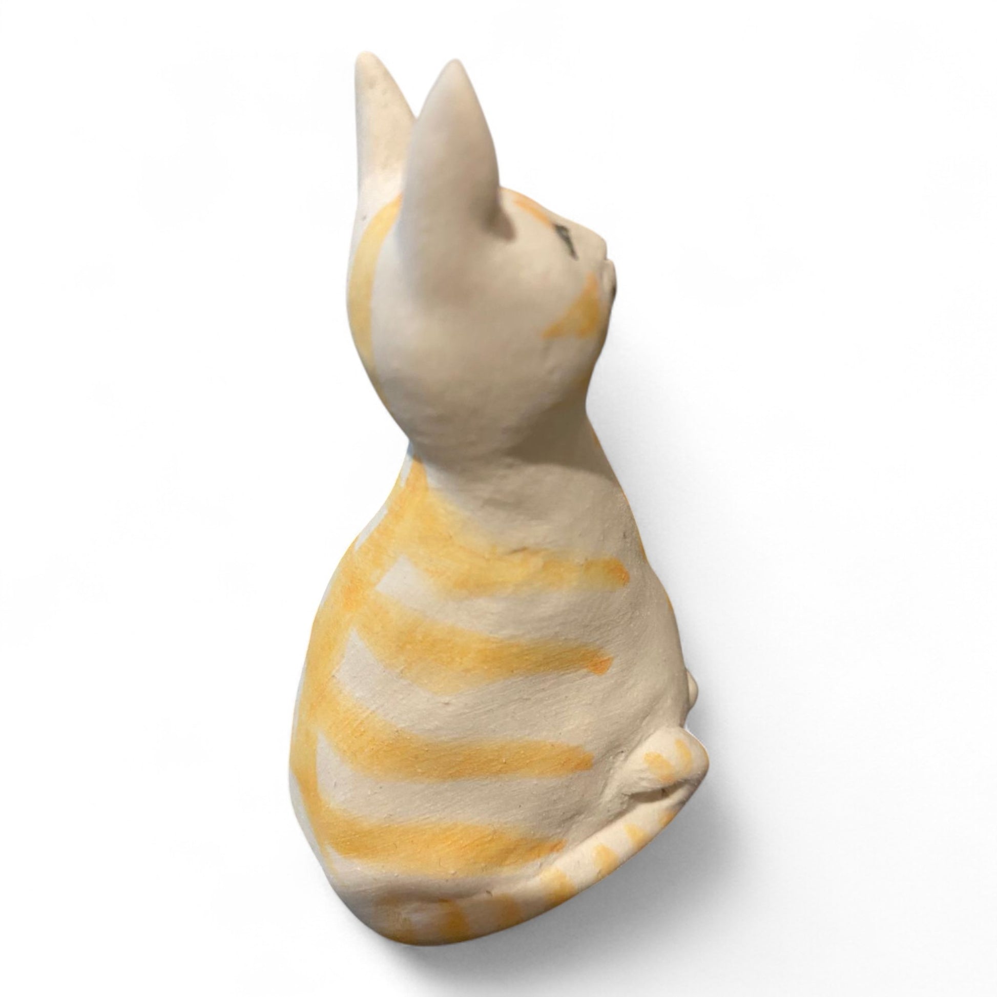 Porcelain yellow striped cat figurine