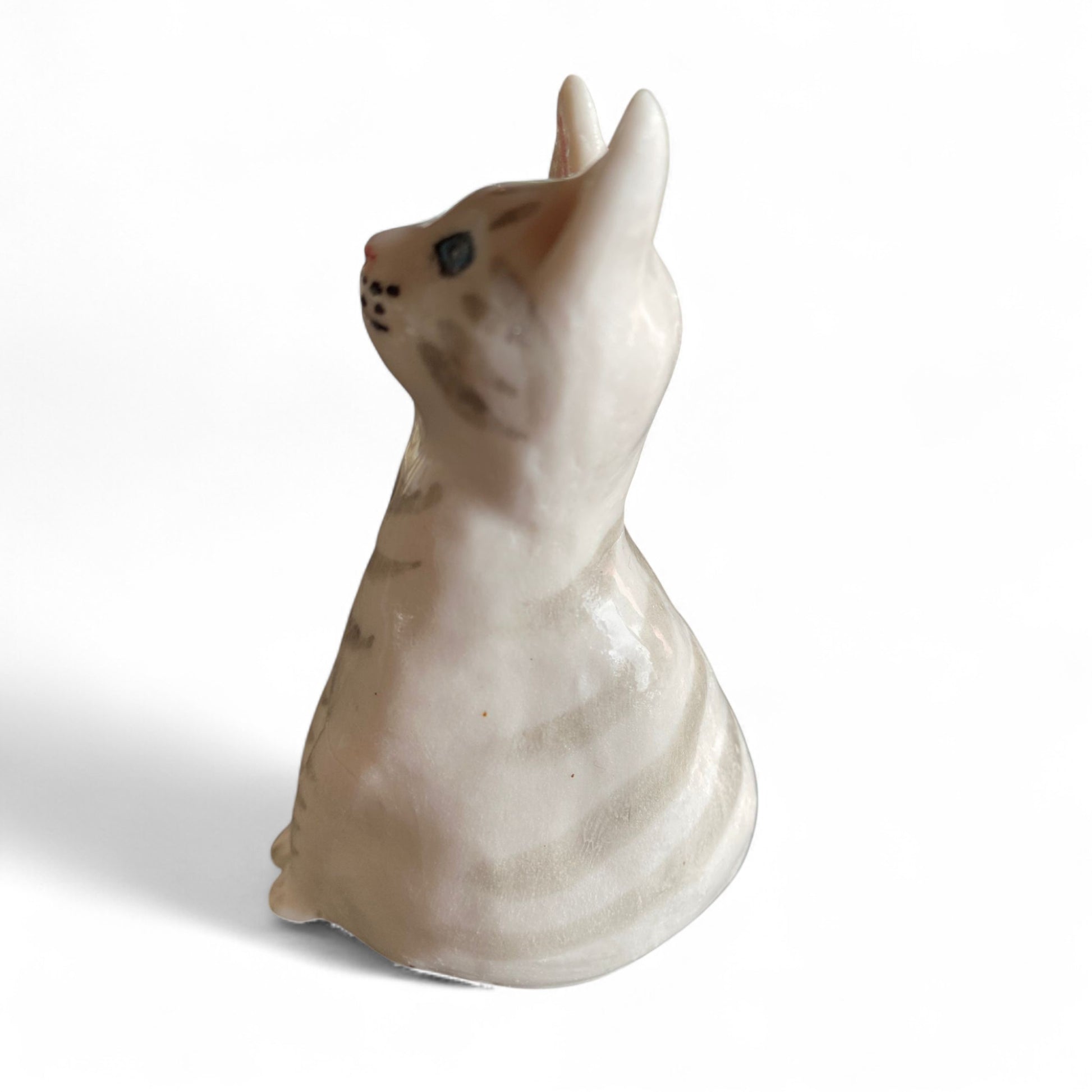 "Lady Cynthia" Small porcelain cat figurine on a white background