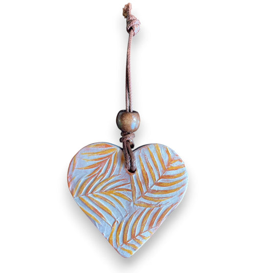 Ceramic Heart with blue and gold Fern pattern on a white background
