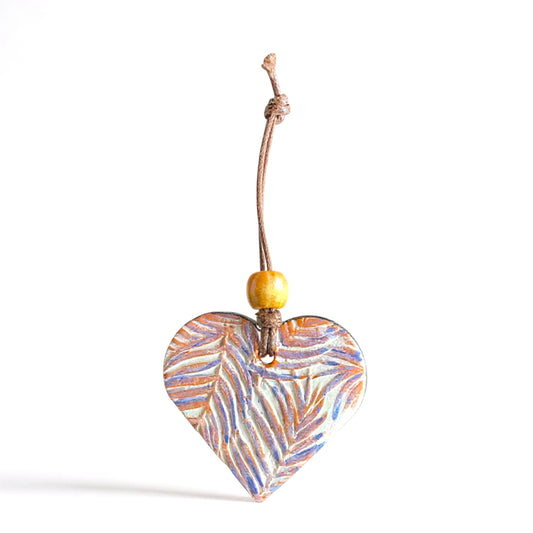 Ceramic Heart with a patterned design of New Zealand Ferns on a white background