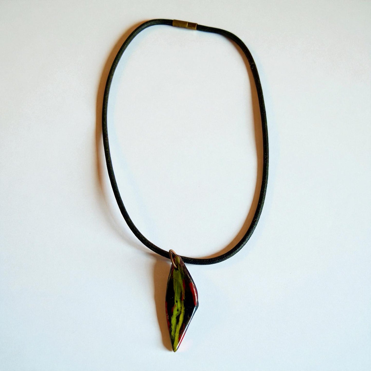 Necklace with a unique pendant on a white background