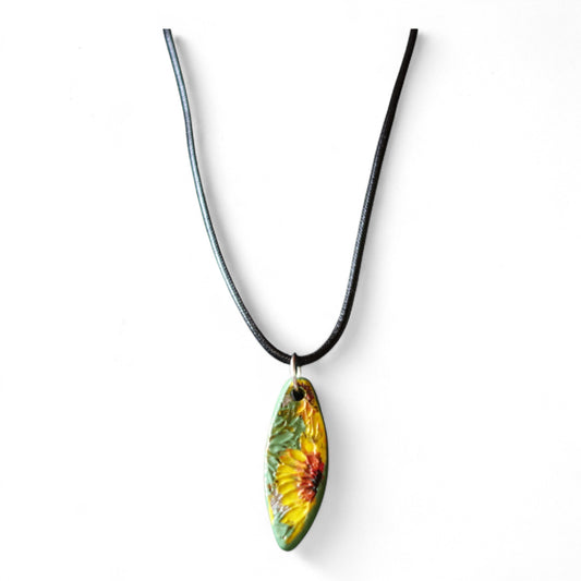 Ceramic pendant with Van Gogh Sunflower designed by Yoko d'Arnaud - Celsius Ceramics.