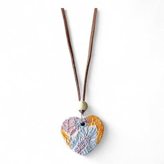 Ceramic pendant with Van Gogh Sunflower designed by Yoko d'Arnaud - Celsius Ceramics.