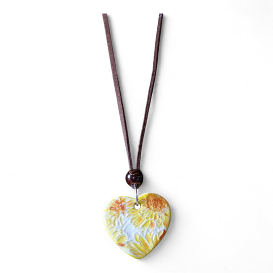 Ceramic pendant with Van Gogh Sunflower designed by Yoko d'Arnaud - Celsius Ceramics.