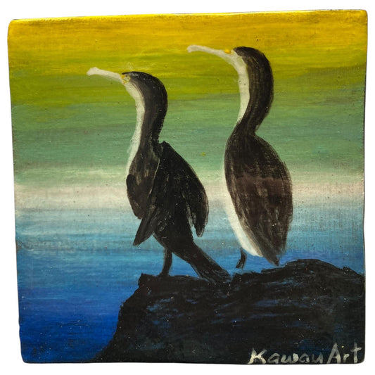 Two NZ Shag birds on a rock with a gradient background