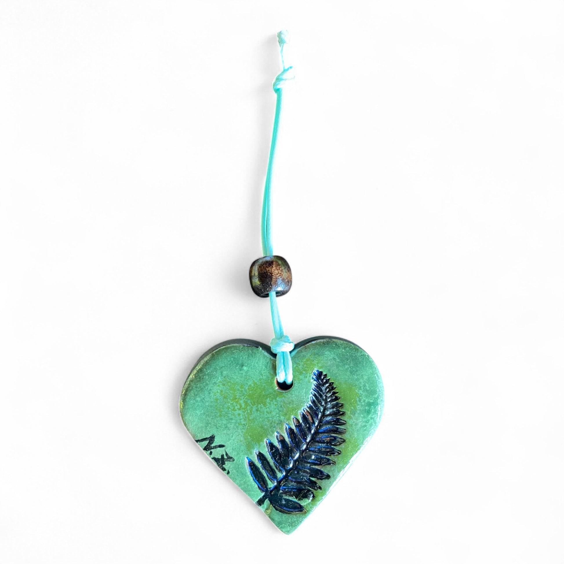 Terracot heart shaped essential oil diffuser.