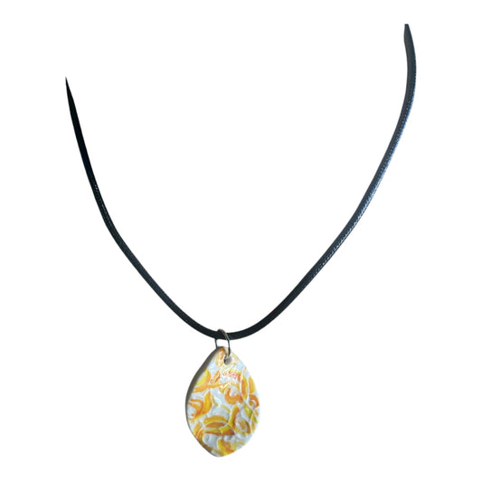Necklace with a floral pendant on a white background