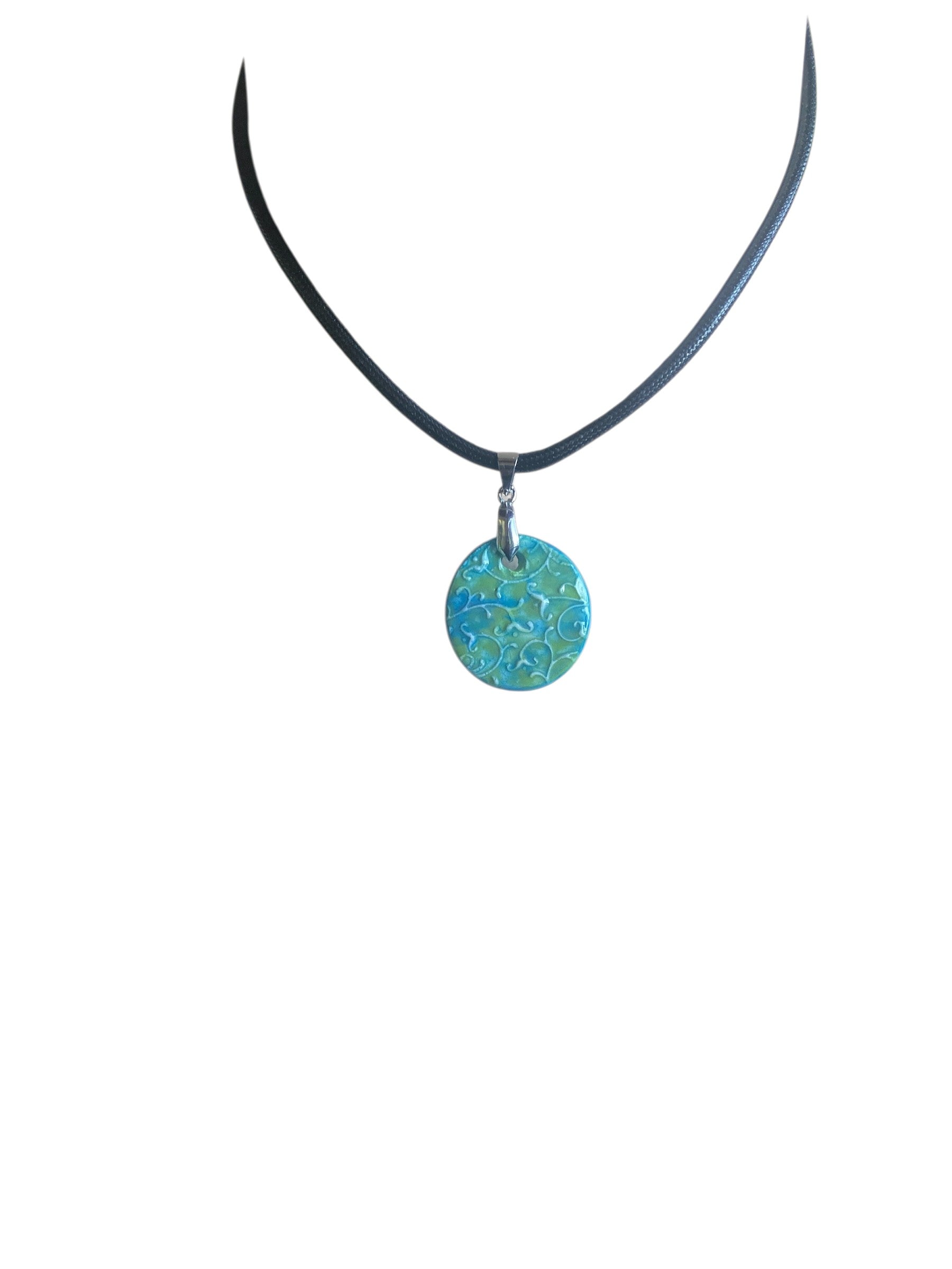 Necklace with a round blue pendant on a white background