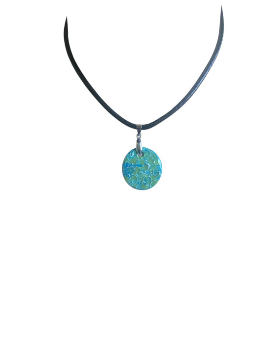 Necklace with a round blue pendant on a white background