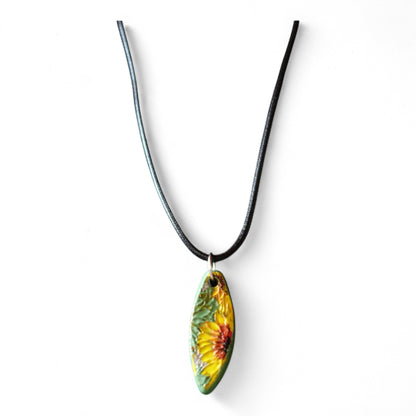 Ceramic pendant with Van Gogh Sunflower designed by Yoko d'Arnaud - Celsius Ceramics.
