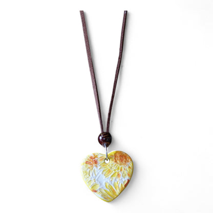 Ceramic pendant with Van Gogh Sunflower designed by Yoko d'Arnaud - Celsius Ceramics.
