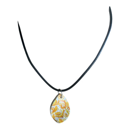 Necklace with a floral pendant on a white background