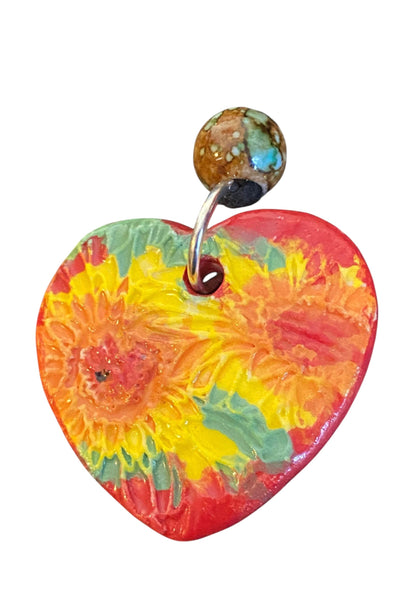 Ceramic pendant with Van Gogh Sunflower designed by Yoko d'Arnaud - Celsius Ceramics.
