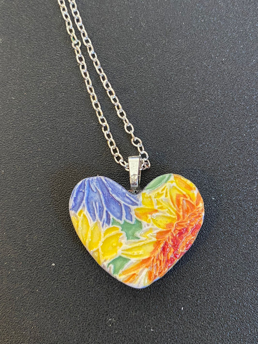 Ceramic pendant with Van Gogh Sunflower designed by Yoko d'Arnaud - Celsius Ceramics.
